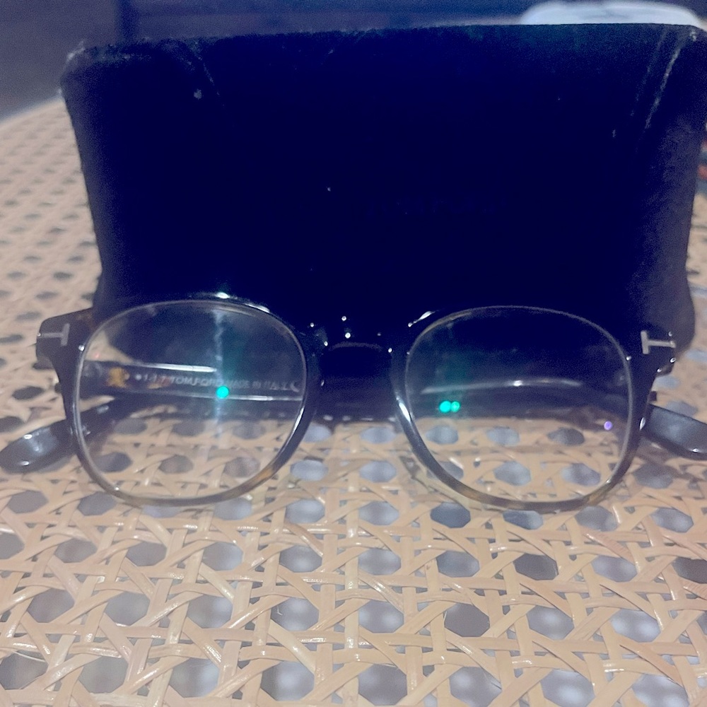 Brand new prescription glasses with a case.